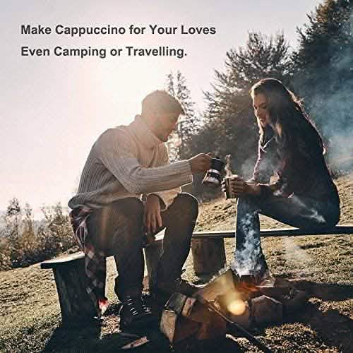 Couple enjoying coffee outdoors while camping, showing the portable frother for travel use